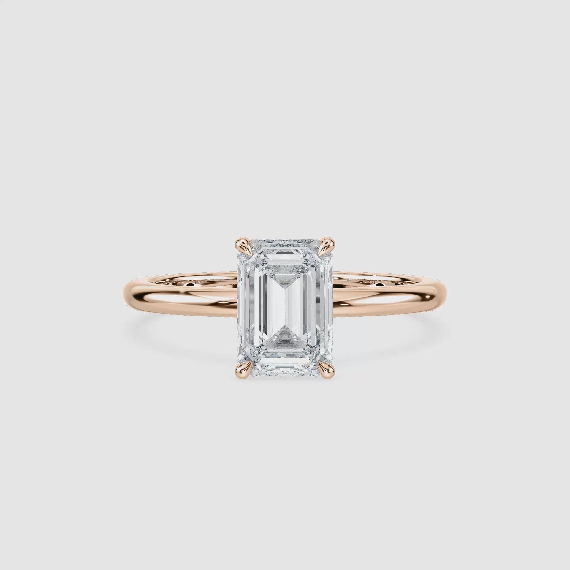 Video laden: Clara Solitaire Verlobungsring – Smaragdschliff – Roségold – Video