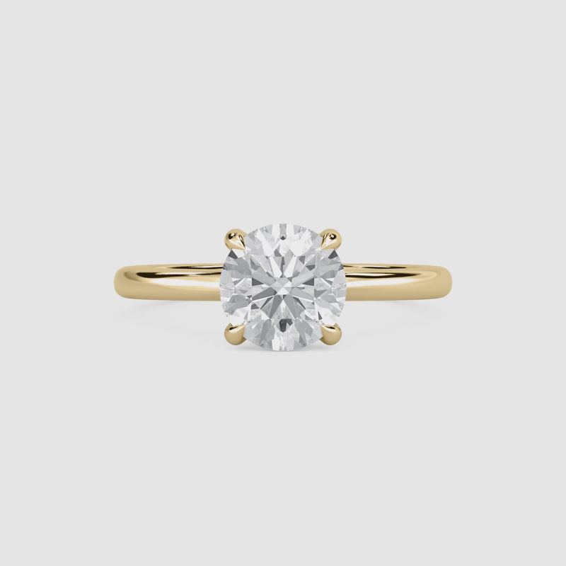 Clara Solitaire Verlobungsring – Rundschliff – Gelbgold – Video
