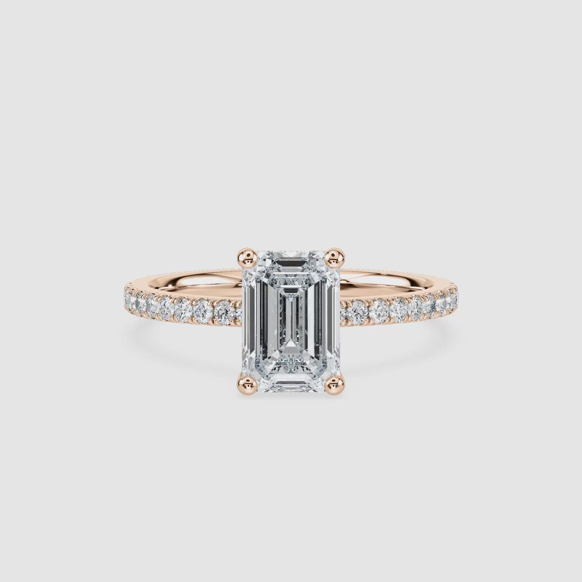 Video laden: Luisa Hidden Halo Verlobungsring – Smaragdschliff – Roségold – Video